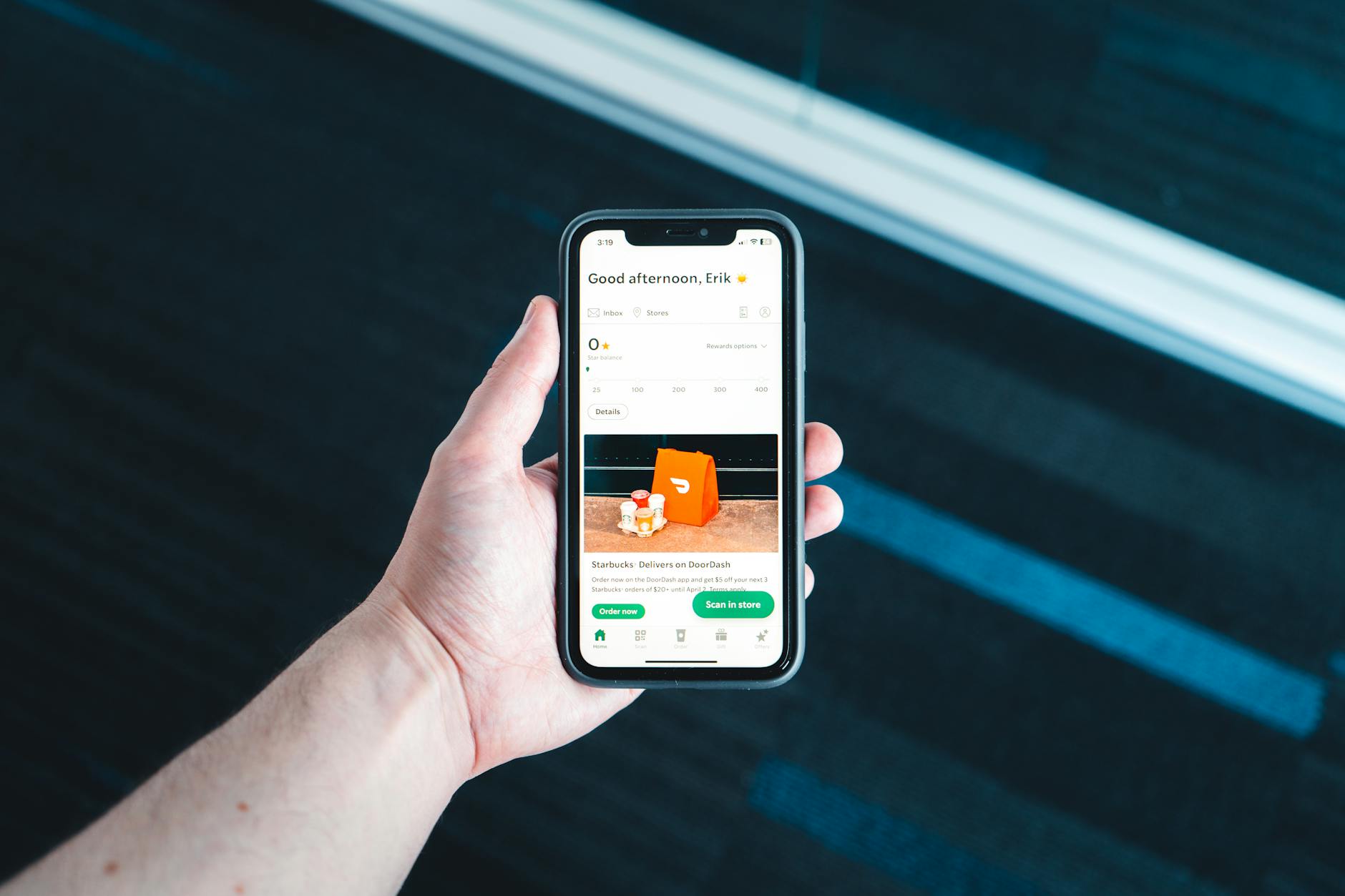 Person using a tablet to browse a well-designed ecommerce website with clear navigation